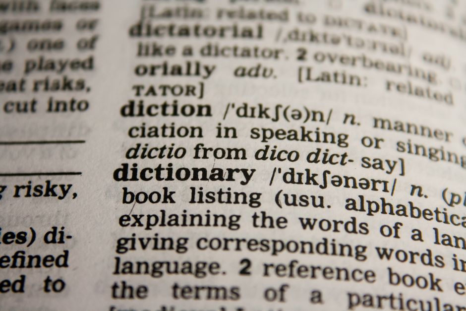 Detailed close-up view of a dictionary page highlighting the word
